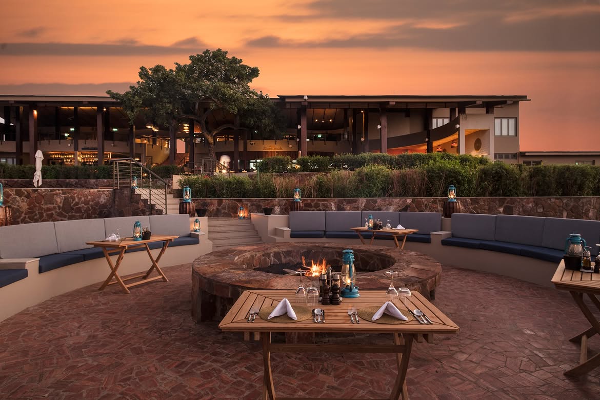 Boma fire pit dinner setting at Meliá Serengeti Lodge
