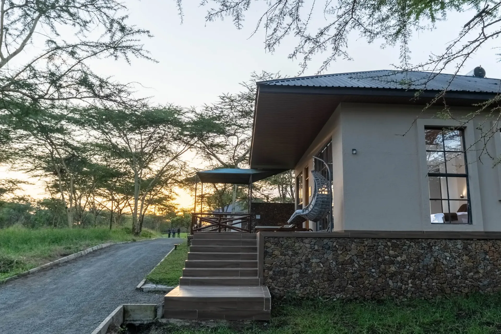 Aya Sophia villa at sunset with private steps and hanging chair