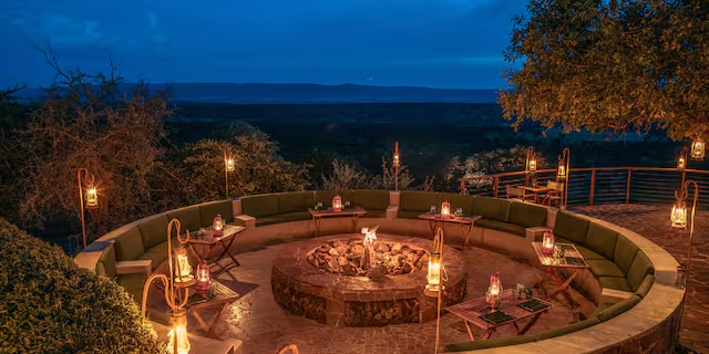Lantern-lit outdoor boma at Meliá at dusk