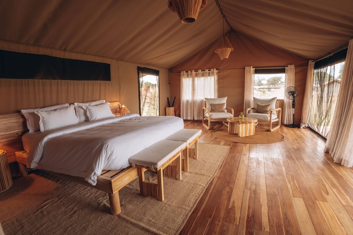 Spacious luxury tent bedroom at Conserve Safari