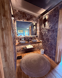 Stone-clad tented bathroom at Mapito Safari Camp