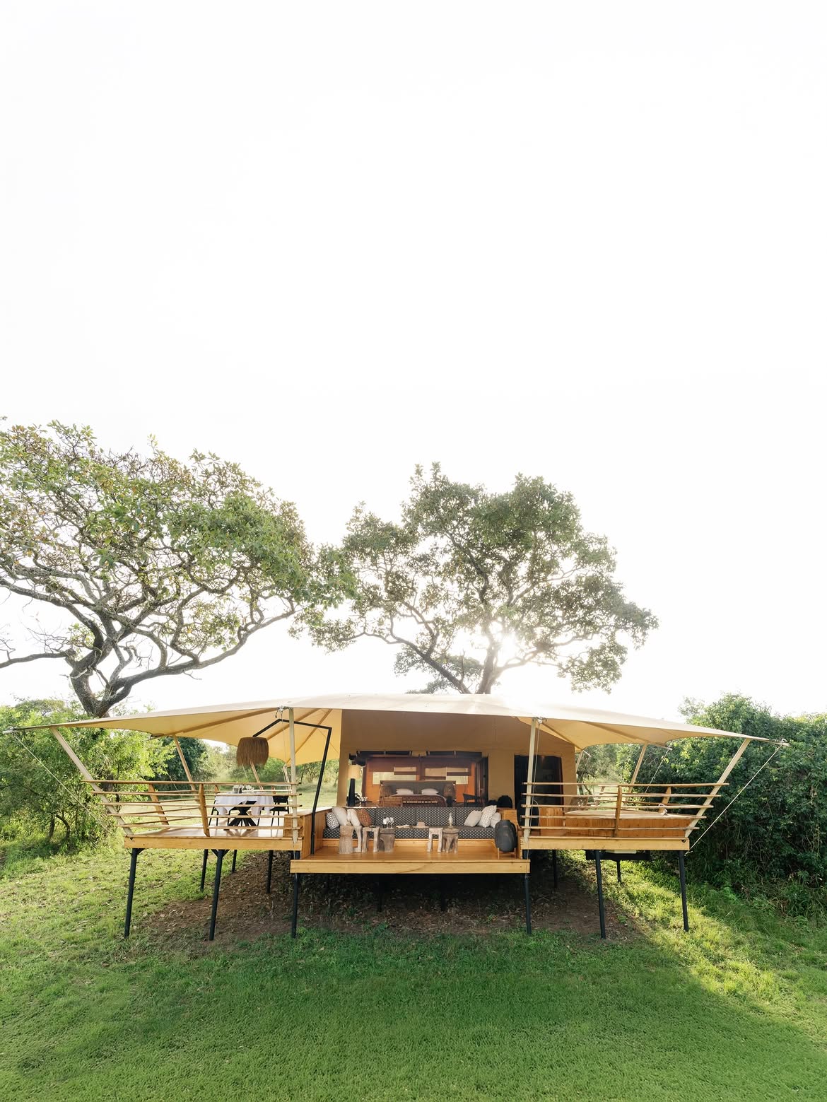 Raised luxury tent on stilts at Bushtop Serengeti Camp